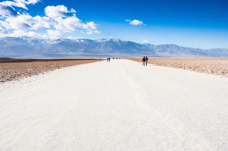 White salted road at Badwater basin, Death Valley National Park. California.の写真素材