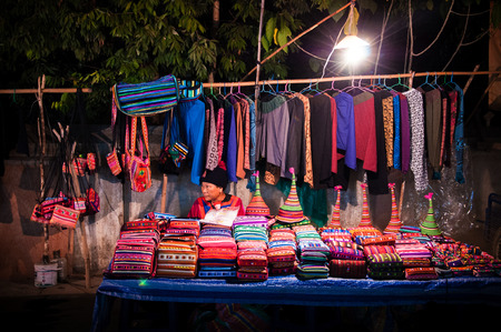 Local hill tribe cloth shop at night market  in Pai, Maehongson, Thailand. Photo was taken on Jan 11, 2010.のeditorial素材