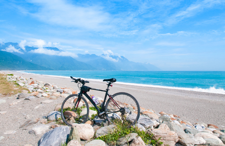 Scenery of Chishintan Beach with a bicycle, Hualien, Taiwanの写真素材