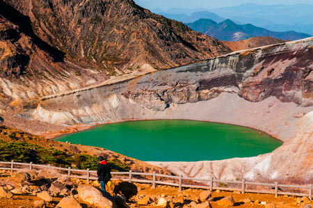 Tourist was exploring the volcano crater of Mount Zao. Yamagata - Miyagi, Japan : Oct 18, 2014の写真素材