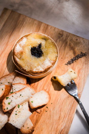 Brie cheese with toasted breadの写真素材