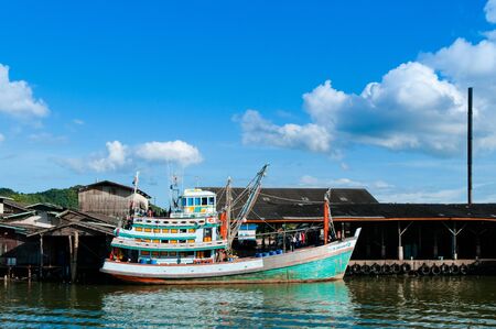 Old fishing boats in river, Thailandのeditorial素材