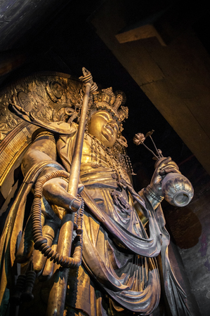 Famous ancient wooden Kannon deity statue at Hasedera Templeのeditorial素材