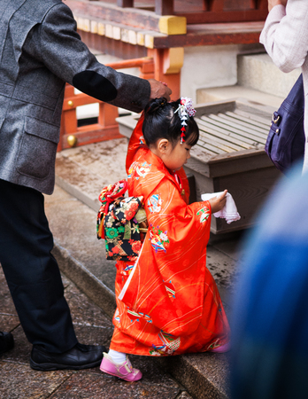 OCT 30, 2011 Nara, Japan : Little girl in Kimono dress at Japanese shrineのeditorial素材