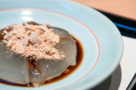 Warabimochi, Japanese Mochi dessert with Kinako or soybean powder.の写真素材