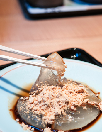 Warabimochi, Japanese Mochi dessert with Kinako or soybean powder.の写真素材
