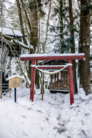 JAN 22, 2014 Kakunodate - Akita - Japan : Small shrine coverd with snow during mid winter at Samurai residence area.のeditorial素材