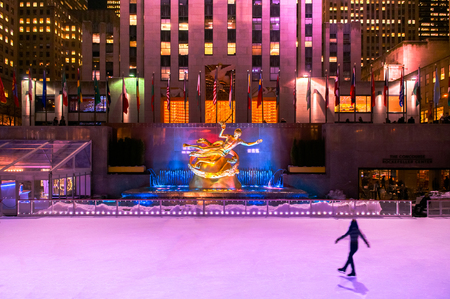 Rockefeller center ice skte rink with colorful lighting.のeditorial素材