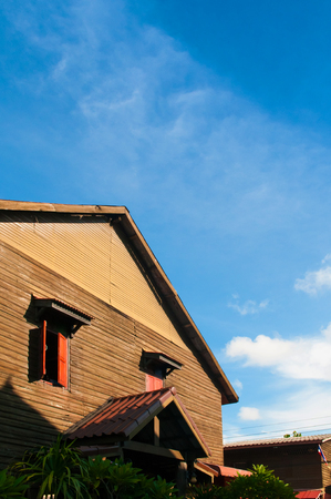 Koh Lanta City, Koh Lanta old town wooden house with red window on clear blue sky dayの写真素材