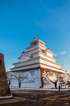 Evening Winter sky at Japanese Castle tower of Aizu Wakamatsu Castle in Fukushima, Tohoku, Japanのeditorial素材