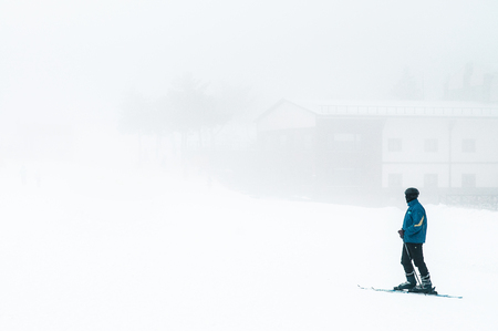 JAN 3, 2018 Kayseri, Turkey : Tourist on Mt. Erciyes ski resort covered with snow in winter on a foggy dayの写真素材