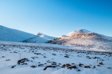 Mt. Erciyes volcano covered with snow in winter season, on a clear sky dayの写真素材