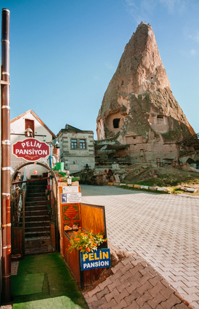 JAN 3, 2018 Goreme, Nevsehir, Turkey : Local style guesthouse and small street in Goreme Cappadocia, Turkey in a beautiful winter dayのeditorial素材
