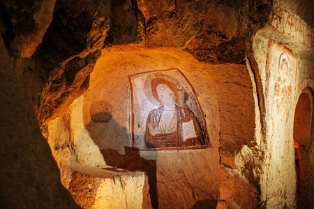 JAN 3, 2018 Goreme, Nevsehir, Turkey : Antique Fresco painting on a wall of cave church at Goreme Open air museumのeditorial素材