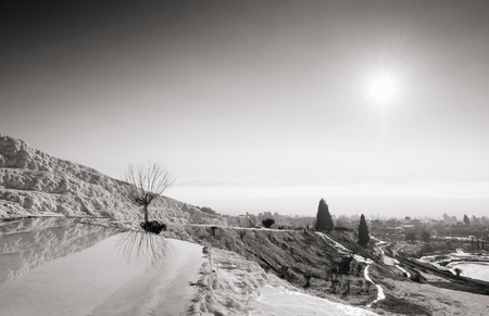 Beautiful extraodinary calcium carbonate limestone landscape of Travertine pools terraces in Pamukkale, Denizili, Turkeyの写真素材
