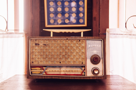 MAR 1, 2018 Uthaithani - Thaialnd : Antique rustic retro vintage wooden transistor radio country house interior conceptのeditorial素材