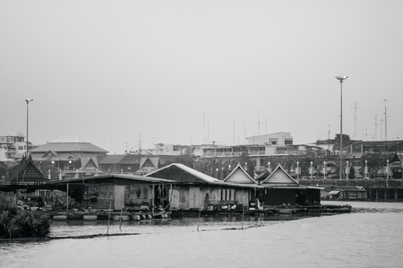 MAR 2, 2018 Uthaithani - Thailand : Traditional vinatge local floating house or raft house in riverのeditorial素材