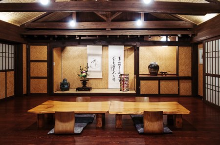 JAN 30, 2013 Okinawa, Japan : Japanese Okinawa style room solid wood table, paper door, and tatami wall, vintage japanese Okinawan interiorのeditorial素材