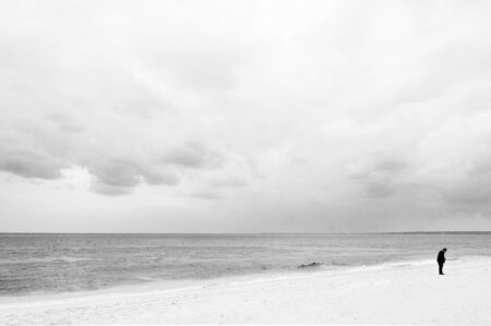 Calm water and white sand at Maehama Beach on cloudy day in early spring season. Miyako isalnd, Okinawa, Japan.の写真素材
