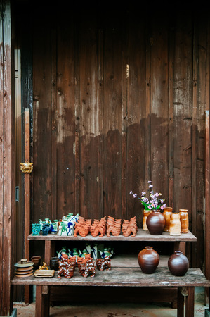 JAN 28, 2013 Naha, Okinawa, JAPAN : Ceramic Shisa lion guardian model sculptures in vintage souvenir shop, Naha, Okinawaのeditorial素材