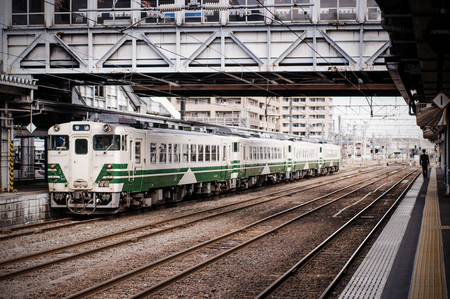 Akita, JAPAN - Oct 16, 2014: The local trains at Akita station.  Operated by East Japan Railway Company (JR East).のeditorial素材