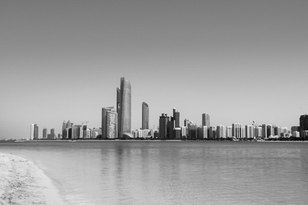 Abu Dhabi sky line and city scene shots from white sand beach on marina islandのeditorial素材