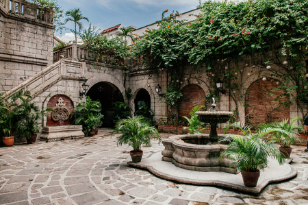 NOV 20,2012 , Manila, Philippines : Old historic beautiful Spanish Colonial house court garden and fountain in Casa Manila near San Augustin churchのeditorial素材