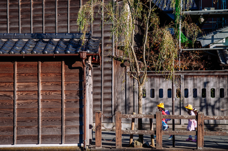 DEC 11, 2012 Katori, Chiba, JAPAN - Old vintage wooden Japanese house along small street by Tonegawa river in Sawara village, famous little Edo old town near Tokyo.のeditorial素材