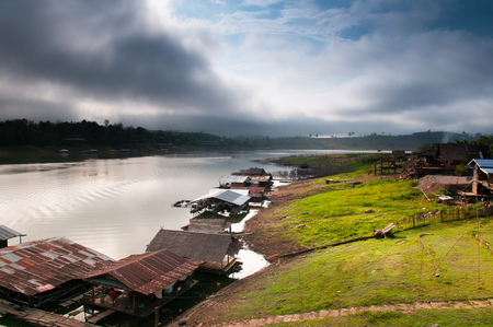 landscape of floating village raft houses in Sangkhlaburi, Kanchanaburi, Thailandの写真素材