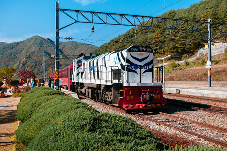 OCT 24, 2013 Gangwon-do, South Korea - V-Train sightseeing train run along stream and valley of...