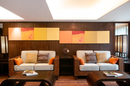 NOV 13, 2013 Samui, Thailand - Tropical Resort villa living room with wooden furniture, armchairs, daybed, contemporary colonial interior luxury decorationのeditorial素材