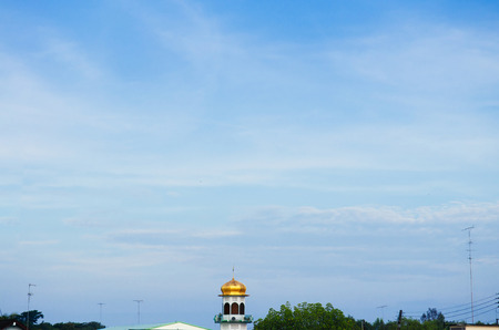 Blue morning sky and Golden dome old historic Mosque of Ban Nam Chiao in Trat province, Thailandの写真素材