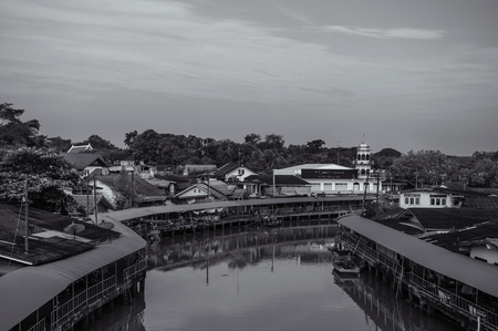 OCT 4, 2018 Trat, Thailand - Vintage Waterside village named Ban Nam Chiao with view of historic mosque and wooden house along tropical canal.のeditorial素材