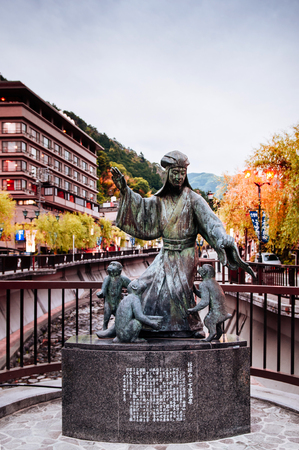 MAY 25, 2013 Gifu, JAPAN - Vintage art sculpture on the street of Gero onsen spa resort town at sunset time in autumn seasonのeditorial素材