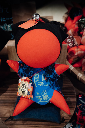 MAY 26, 2013 Takayama, Gifu, JAPAN - Japanese Sarubobo doll famous souvenir, red fabric doll use as amulet for kid mostly made by mother or grandmotheruseのeditorial素材