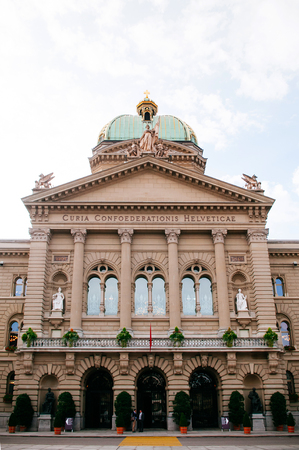 SEP 28, 2013 Bern, Switzerland - Swiss capital parliament building with green dome roof against sky...