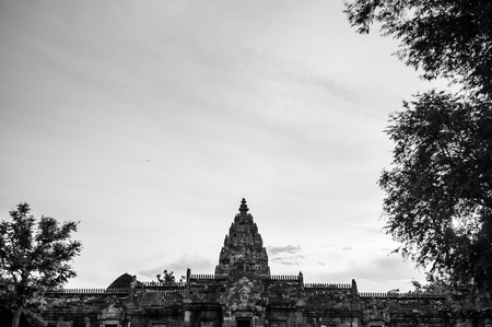 Buriram, Thailand - Black and white image of Phanom Rung sandstone castle historical Park, ancient thousand years Khmer architecture castle rock with lotus pond in front courtyard.の写真素材