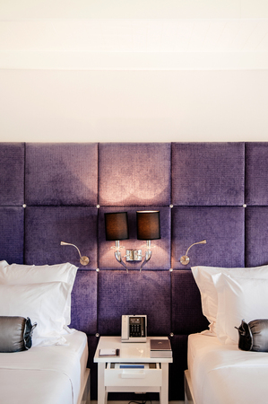 MAR 13, 2014 Bangkok, THAILAND - Vintage luxury interior hotel room, bed and well design lamp, side table. Vintage sweet luxury home decorating design natural lightのeditorial素材