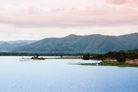 Camping tents at Blue lake of Yang Chum Water reservior dam warm evening summer sky - Prachuab Khiri Khan, Thailandの写真素材