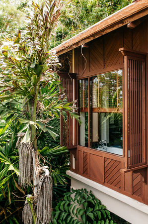 MAY 22, 2014 Krabi, THAILAND - Asian luxury style hotel Bathroom with tropical garden window. Asian tropical resort style interior decorationのeditorial素材