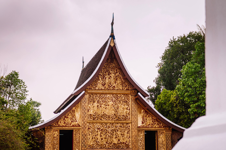 Golden Buddha Hall near Main hall of Wat Xieng thong, Luang Prabang, Laosのeditorial素材