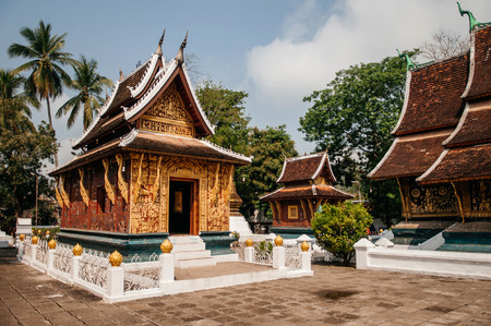 Ancient Golden Buddha hall  Mural art wall at Wat Xieng thong, Luang Prabang, Laosのeditorial素材