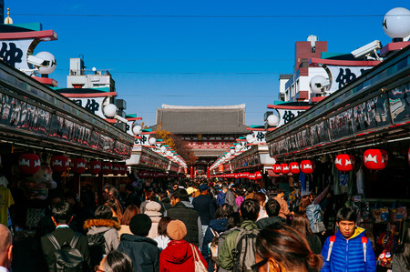 NOV 29, 2018 Tokyo, Japan - Asakusa Sensoji temple giant sacred red lantern or Chochin at Hozomon gate with many tourists. Tokyo most famous attraction and recognized symbolのeditorial素材