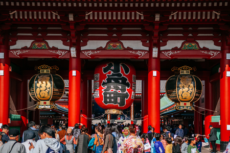 NOV 29, 2018 Tokyo, Japan - Asakusa Sensoji temple giant sacred red lantern or Chochin at Hozomon gate with many tourists. Tokyo most famous attraction and recognized symbolのeditorial素材