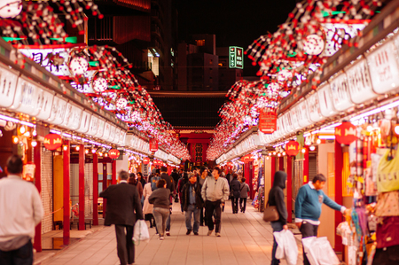 Tokyo, Japan - NOV 30, 2018 : Asakusa Sensoji temple shopping street at Hozomon gate with many tourists at night. Place for Japanese snack and souvenirのeditorial素材
