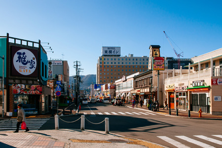 DEC 2, 2018 Hakodate, JAPAN - Asaichi morning fish market and Kaiko street junction under bright...
