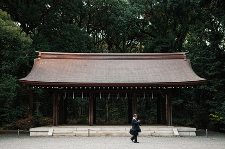 DEC 5, 2018 Tokyo, Japan -Meiji Jingu Shrine Historic Wooden pavilion in lush green park - Most important shrine and city green space of Japan capital city.のeditorial素材