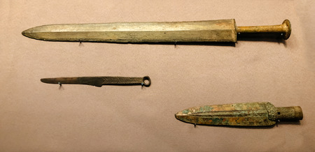 OCT 24, 2019 Bangkok, Thailand - Bronze sword, knife and spear head from Qin Shi Huang tomb...