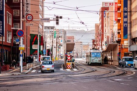 DEC 2, 2018 Hakodate, JAPAN - Hakodate city tram vintage streetcar at station. The Tram well -established network throughout the city, and are main transportation for sightseeing.のeditorial素材