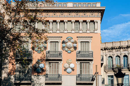 OCT 27, 2012 Bearcelona, Spain - Old Classic buildings on La Rambla street under warm beautiful sunlight in afternoon.のeditorial素材